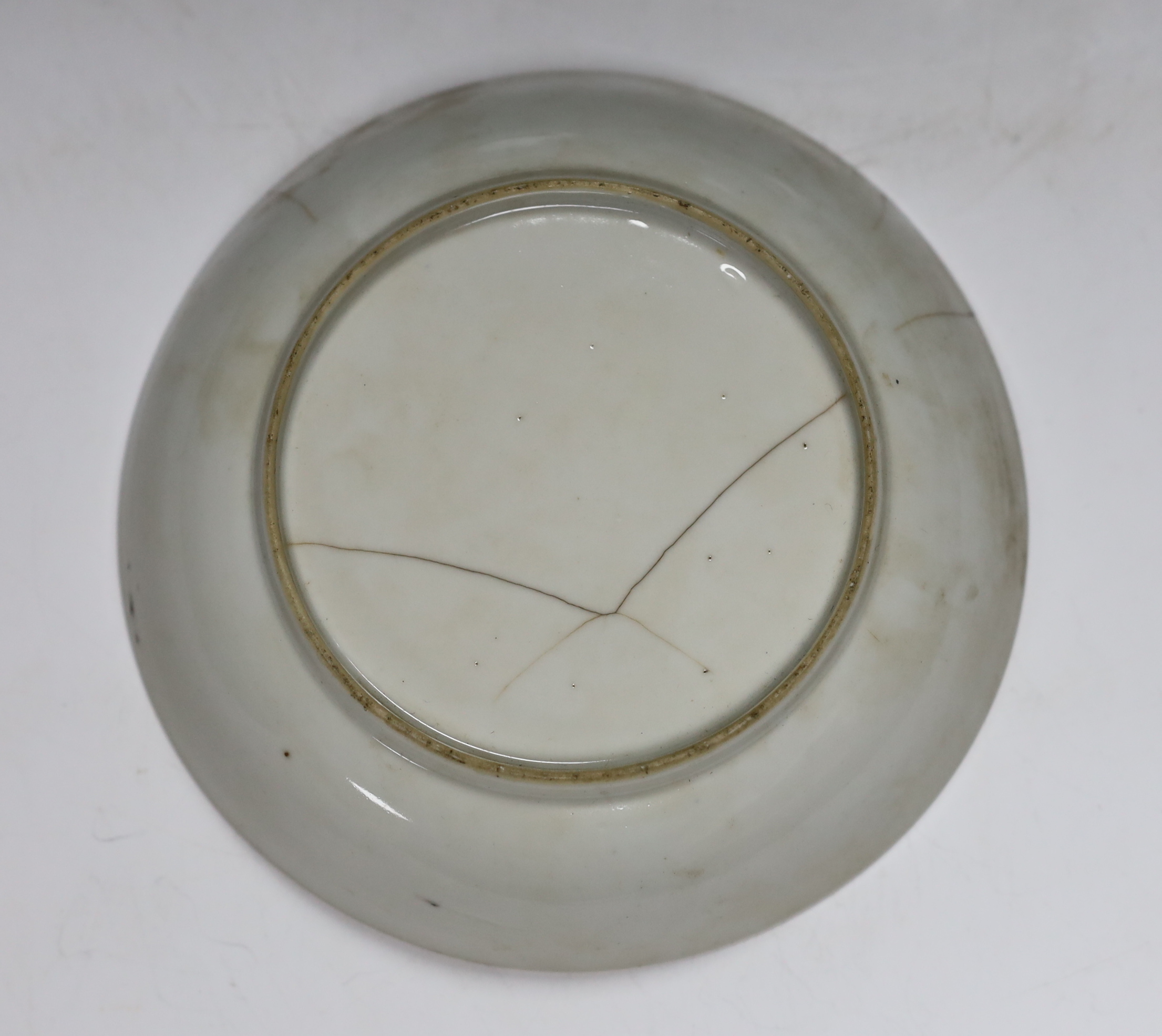 Two Chinese blue and white plates and a similar shallow bowl, largest 26cm high
